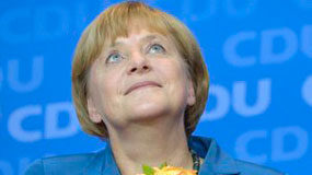 Merkel s’empassa els socis